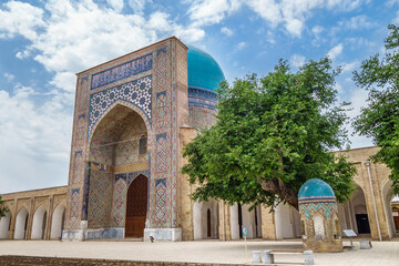 Fototapeta na wymiar Facade of Kok-Gumbaz mosque or Blue Dome in translation, Shakhrisabz, Uzbekistan. It is part of architectural historical complex Dorut Tilavat, founded in XIV. Included in UNESCO