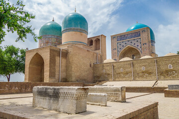 Sheikh Kulal Mausoleum and Kok Gumbaz Mosque in Shakhrisabz, Uzbekistan. In foreground are medieval...