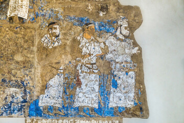 Antique fresco of VII-VIII AD from Central Asia from Ishkhid palace. Courtiers are depicted. Clothing contains individual symbols that later became traditional. Afrasiab Museum, Samarkand, Uzbekistan