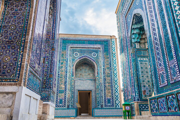 Facades of mausoleums of the Shah-i-Zinda complex, Samarkand, Uzbekistan. From left to right: Tuman-aga, Khojda Ahmad, Nameless. Included in UNESCO. Inscription on green box: 'donation box'