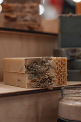 Handmade natural soap on wooden background. Spa natural treatments. Organic natural soap for spa and wellness products.