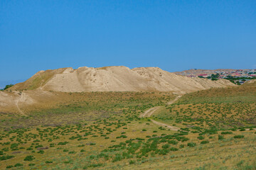 Afrasiyab, most ancient site in Samarkand, Uzbekistan. Central hill is former citadel with royal...