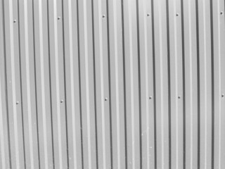 Texture of corrugated metal plate on the fence