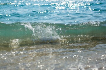 Wave of the Sea on a Beach