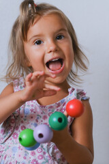 Fototapeta na wymiar girl with colorful little balls