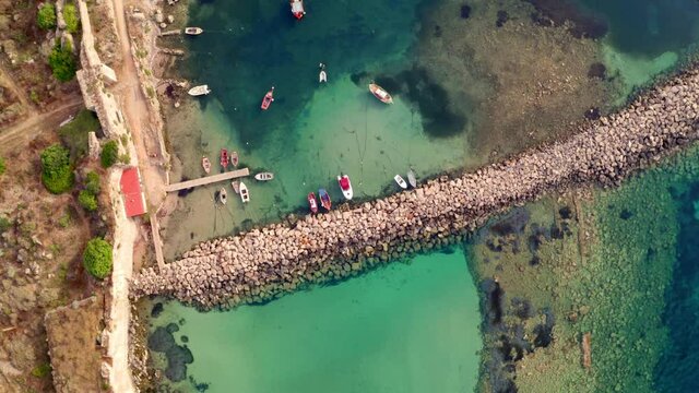 4k drone flight straight-down footage (Ultra High Definition) of Methoni port. Magnificent morning seascape of Ionian sea. Colorful summer scene of Peloponnese peninsula, Greece, Europe..