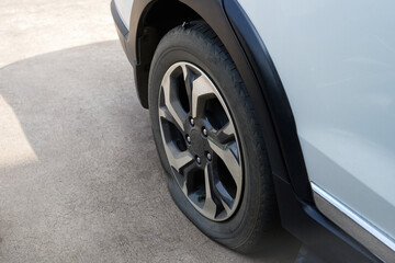 flat car tire parked on the street