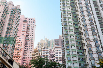 Fototapeta na wymiar Skyline of tall residential skyscrapers of apartments in Central Hong Kong.