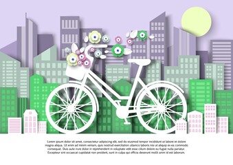 Naklejka premium Women bicycle with flower basket, city building silhouettes, vector paper cut illustration. City eco transport poster.