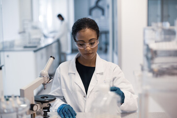 African American female scientist working in a science laboratory