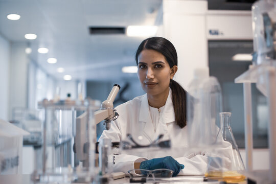 Portrait of Middle Eastern female scientist working in a laboratory