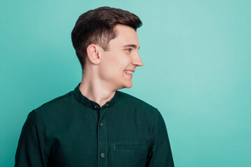 Fototapeta premium Photo profile side of young business man employer look empty space isolated turquoise background