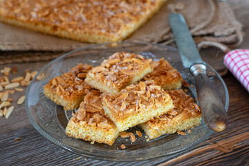 Almond cake on a rustic wooden table