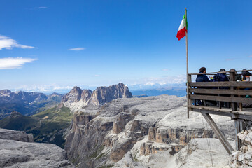 a group of hikers camp out near Capanna Fassa on the top of Piz Boè. Dolomites, Alps, Val di...