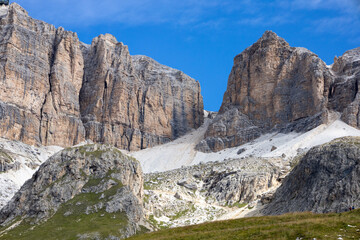 Fototapeta na wymiar amazing alpine scenery at Pass Pordoi on Dolomites mountains. Alps, Val di Fassa, Northern Italy