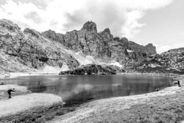 Amazing alpine  scenery at Lake Coldai. Forcella Coldai on Civetta group. black and white panorama...