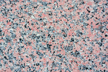 Pink brown granite background close up