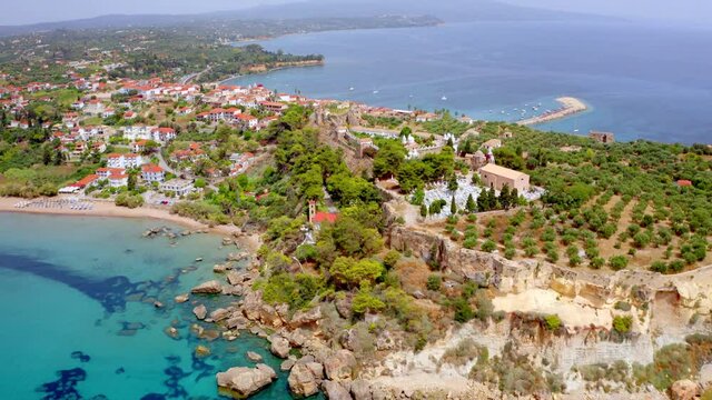 4k drone forward video (Ultra High Definition) of Korony port with Koroni's Castle. Sunny morning seascape of Ionian sea. Picturesque summer scene of Peloponnese peninsula, Greece, Europe..