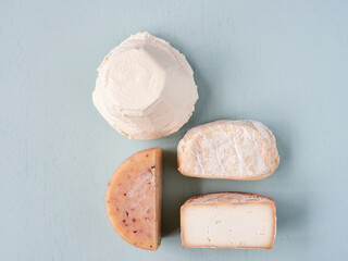 variety of asturian cheese on bluish surface