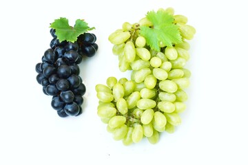 Green grapes, black grapes on a white background