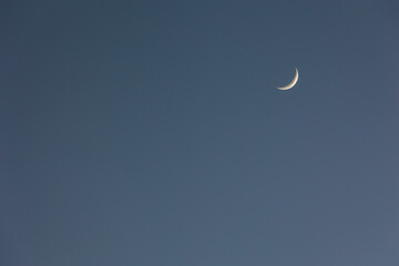Nightscape of waxing crescent moon phase. Nature
