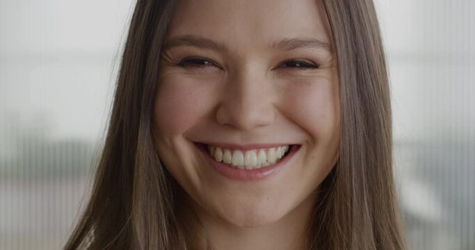 Portrait beautiful business woman smiling happy laughing in office