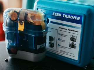 Seaman on a ship training officers fire safety