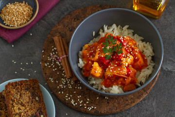 Sesame teriyaki chicken and ginger rice on a table