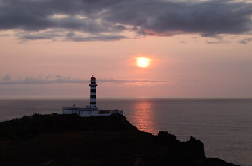 Sunset at the lighthouse of Ponta da Barca, Graciosa island, Azores