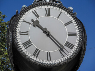 The dial of a street clock in the park. Ternopil, Ukraine