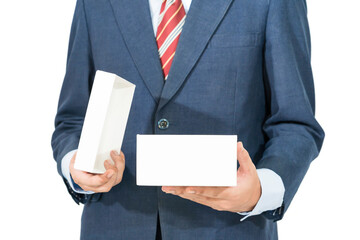 Man in blue suit opening a white gift box with clipping path