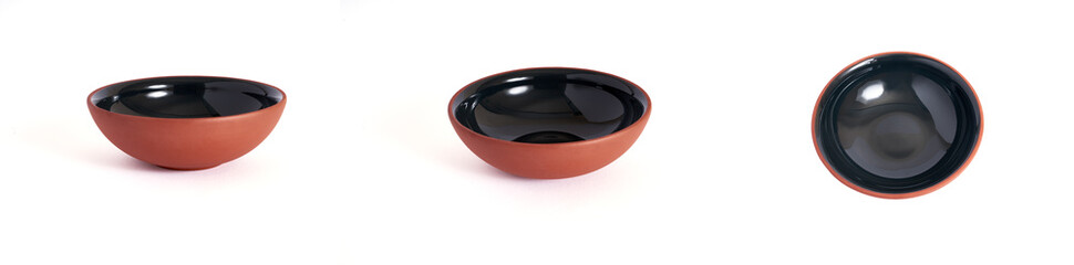 Brown ceramic bowl isolated on white. View from side and from top