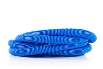 Roll of corrugated pipe tube for electrical installation isolated on white background