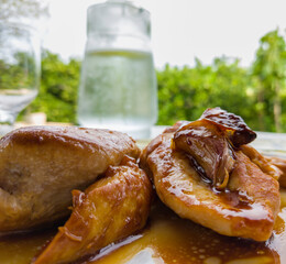 eating chicken outdoors 
