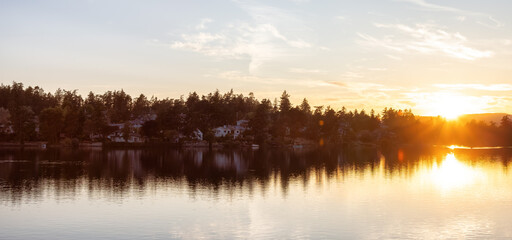 Obraz premium View of a river at Gorge Park, Victoria, Vancouver Island, BC, Canada. Colorful Sunny Summer Sunset.