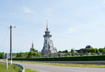 Christian church cross in high steeple tower for prayer