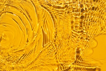 Aqua waves on orange background. Light and shadows. Water spills on a light orange background....