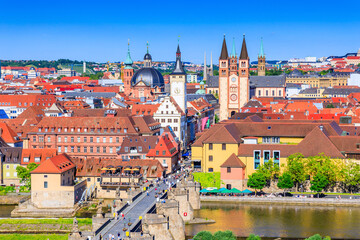 Naklejka na ściany i meble Wurzburg, Germany. Old Town skyline with the towers of St Kilian Cathedral, Neumunster church and the Chapel of St Mary.