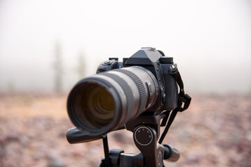 Camera on a tripod.
Landscape photography. HD camera. Outdoor