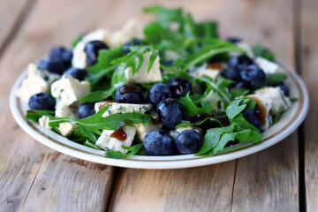 Blueberry and arugula salad. Healthy diet. Keto salad.