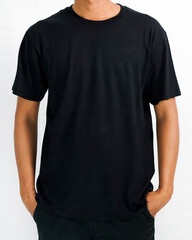 t-shirt mockup in black color. a man wearing a t-shirt for a mockup clothing catalog. mockup graphic from the front view.
