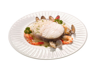 Plato de  merluza con gambas y almejas. Hake dish with prawns and clams.