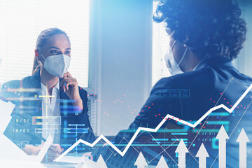 Businessman wearing formal suit works together with businesswoma