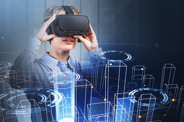 Businesswoman is wearing vr helmet and holding it with hands