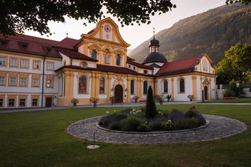 Fotobehang Baroque Cistercian Stams Abbey (Stift Stams) in Stams at sunrise, Imst district, Tyrol, Austria © JMDuran Photography