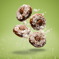 Flying chocolate glazed donuts