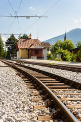 Fototapeta na wymiar Train tracks towards the station in the city center, Telfes Im Stubai, Tyrol, Austria