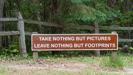 Take Nothing But Photographs, Leave Nothing But Footprints Sign at Tahquamenon Falls State Park,...