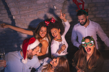 Friends having fun at New Year's Eve party