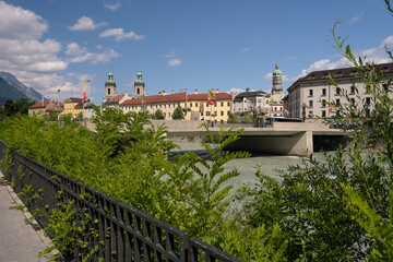 Innsbruck cityscape with the bridge over the river Eno and the old town in the background, Tyrol, Austria